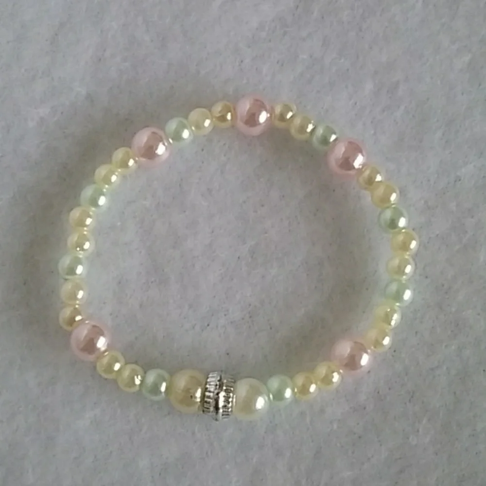 Girls pink, mint, and white beaded bracelet